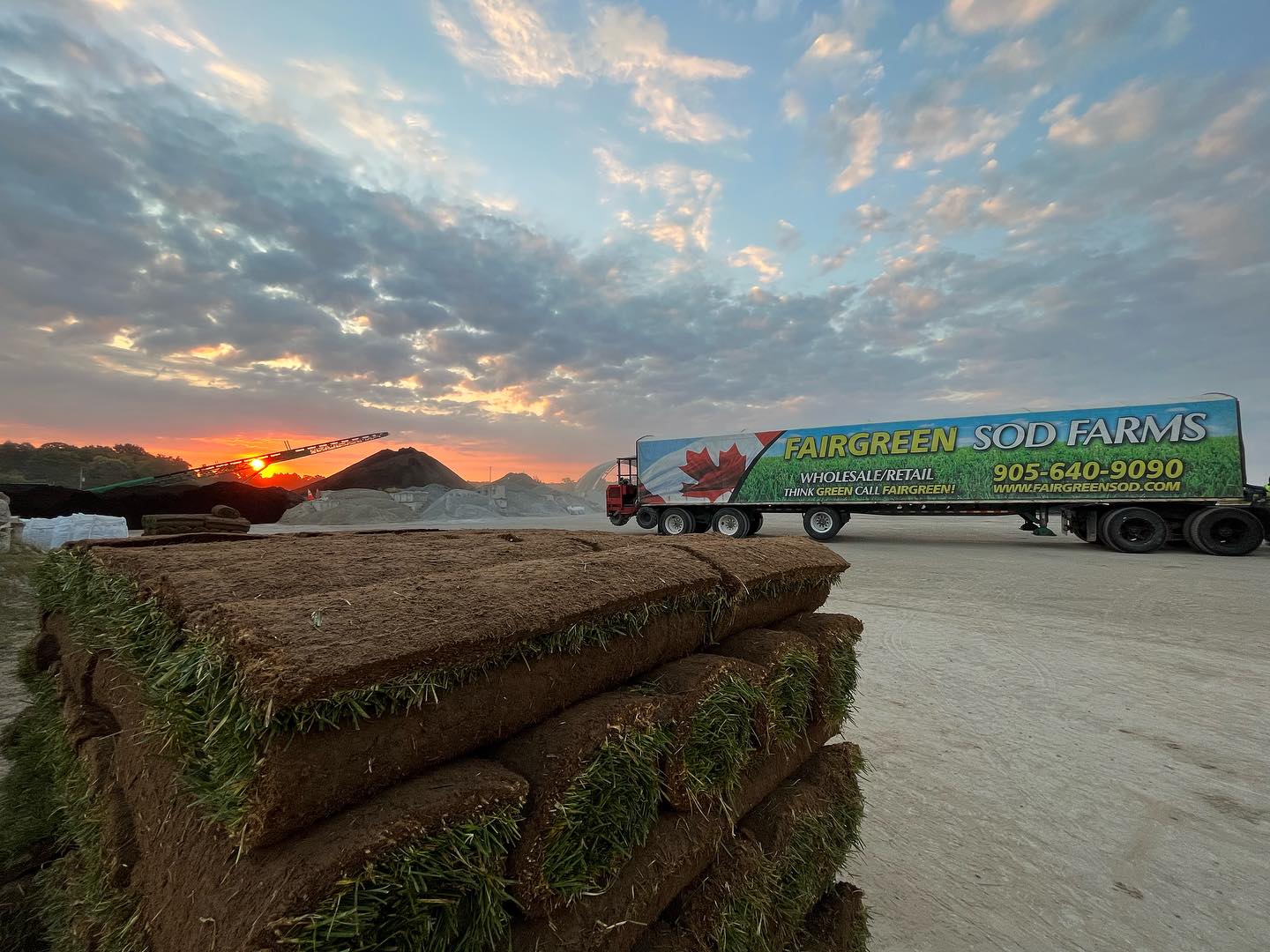 Fairgreen Sod rolls with truck in the background