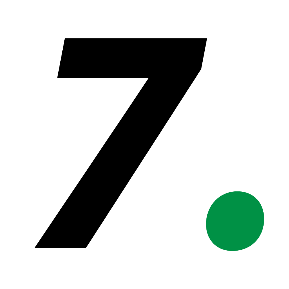 The image features a large, bold black number seven against a white background with a small green dot beside it.