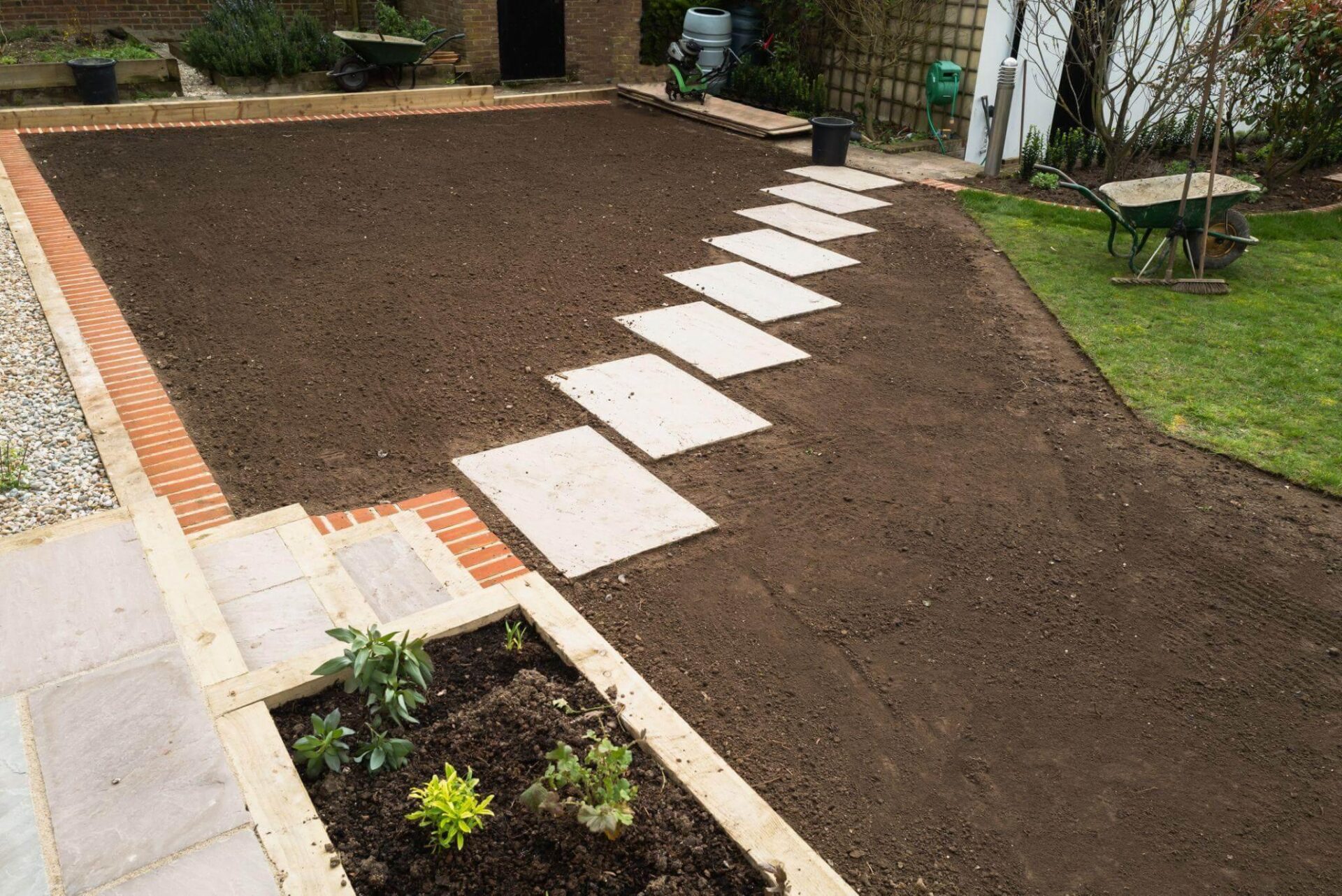 Garden path leading to house for sod installation tips